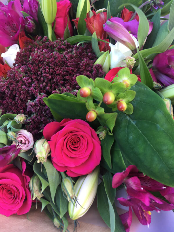 Close up of bright pink wedding flowers